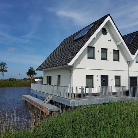 Nr 110 - Ferienhaus Seeperle Pfahlhaus Auf Der Harle Каролинензиль Экстерьер фото