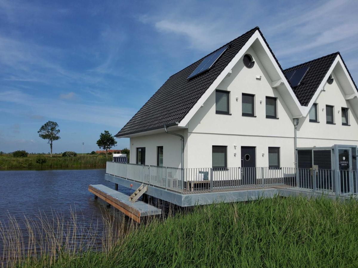 Nr 110 - Ferienhaus Seeperle Pfahlhaus Auf Der Harle Каролинензиль Экстерьер фото